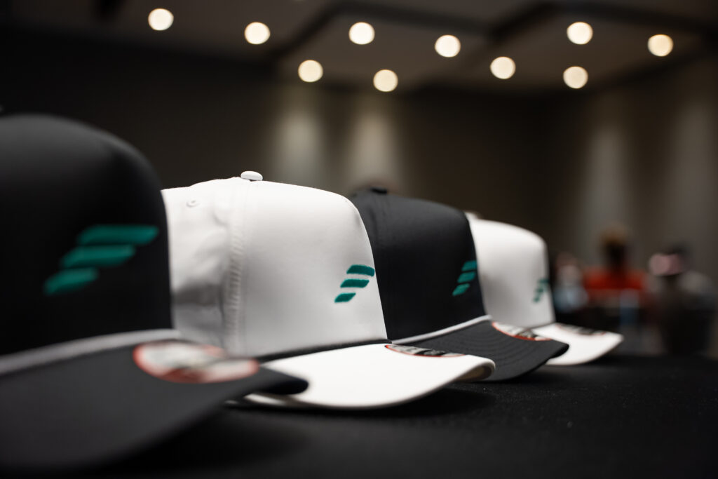 Advisent branded hats