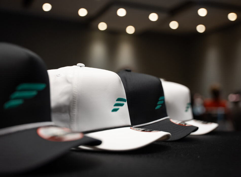 Advisent branded hats